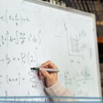 Image of whiteboard with algebra equations